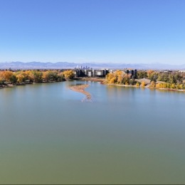a building near a large lake