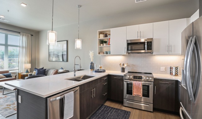 a kitchen with white cabinets